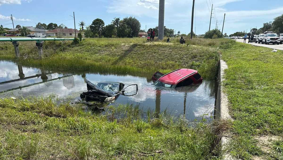 Two vehicles crash into a canal off Lee Boulevard in Lehigh Acres cover image